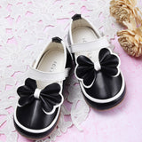 Ebony And Ivory Bow Ballerina