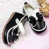 Ebony And Ivory Bow Ballerina